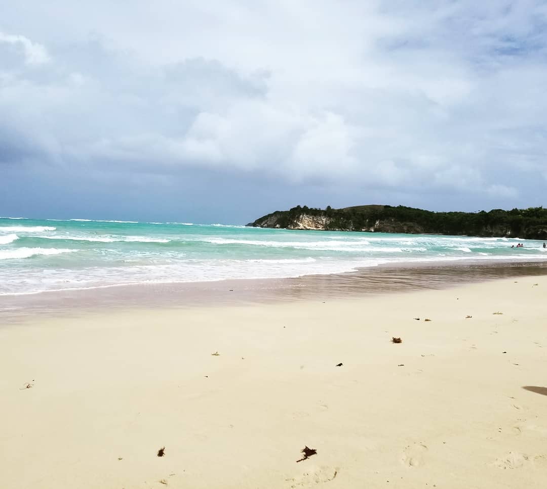 Sandy beach cloudy sky