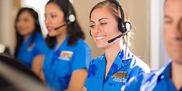 Woman answering phone customer service Amstar